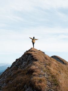 Preview wallpaper mountain, man, alone, peak, freedom