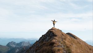 Preview wallpaper mountain, man, alone, peak, freedom