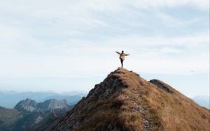 Preview wallpaper mountain, man, alone, peak, freedom