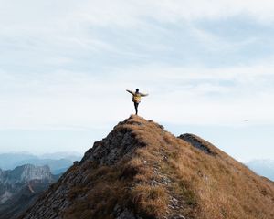 Preview wallpaper mountain, man, alone, peak, freedom