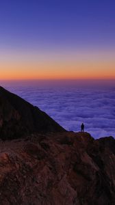 Preview wallpaper mountain, man, loneliness, clouds, al bahah, saudi arabia