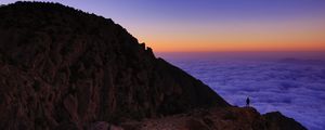 Preview wallpaper mountain, man, loneliness, clouds, al bahah, saudi arabia