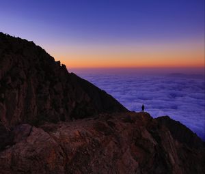 Preview wallpaper mountain, man, loneliness, clouds, al bahah, saudi arabia