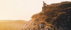 Preview wallpaper mountain, man, loneliness, sunlight, peak district national park, united kingdom