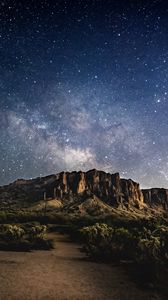 Preview wallpaper mountain, night, stars, starry sky, dark, landscape
