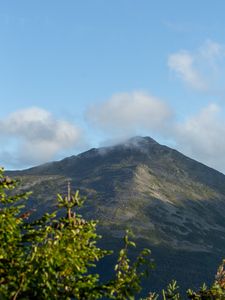 Preview wallpaper mountain, peak, branches, clouds
