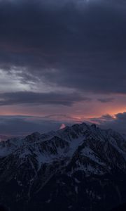 Preview wallpaper mountain, peak, clouds, snowy, sunset, night