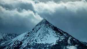 Preview wallpaper mountain, peak, clouds, snow, trees, slope