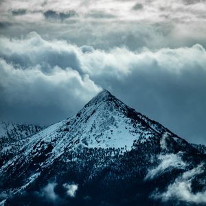 Preview wallpaper mountain, peak, clouds, snow, trees, slope