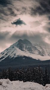 Preview wallpaper mountain, peak, clouds, snow, forest