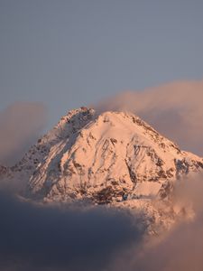 Preview wallpaper mountain, peak, clouds, snow, winter