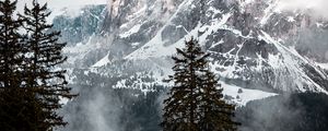 Preview wallpaper mountain, peak, clouds, snow, trees, landscape