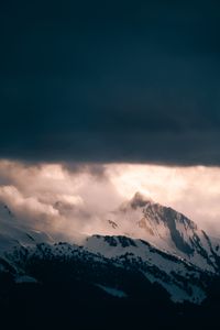 Preview wallpaper mountain, peak, clouds, snow, light, landscape