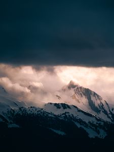 Preview wallpaper mountain, peak, clouds, snow, light, landscape