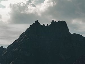 Preview wallpaper mountain, peak, dark, clouds, landscape