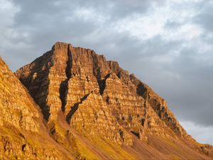 Preview wallpaper mountain, peak, evening, light, nature