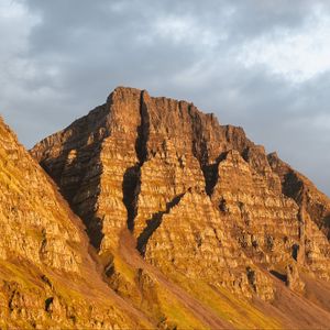 Preview wallpaper mountain, peak, evening, light, nature