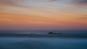 Preview wallpaper mountain, peak, fog, sky, clouds