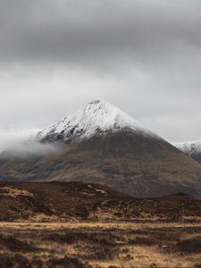 Preview wallpaper mountain, peak, fog, snowy, clouds