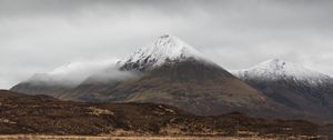 Preview wallpaper mountain, peak, fog, snowy, clouds