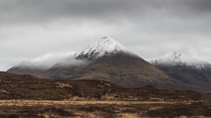 Preview wallpaper mountain, peak, fog, snowy, clouds