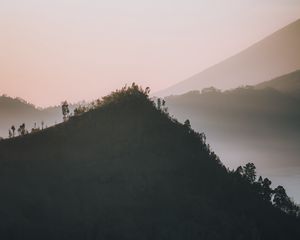 Preview wallpaper mountain, peak, fog, dusk, landscape