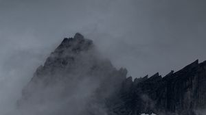 Preview wallpaper mountain, peak, fog, cloud, snow