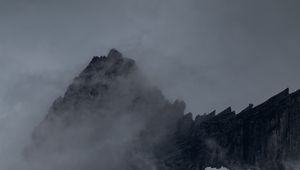 Preview wallpaper mountain, peak, fog, cloud, snow