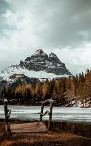 Preview wallpaper mountain, peak, forest, lake, snow, winter