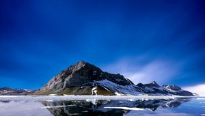 Preview wallpaper mountain peak, island, sea, snow, cold, silence