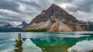 Preview wallpaper mountain, peak, lake, reflection, rocks