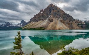 Preview wallpaper mountain, peak, lake, reflection, rocks