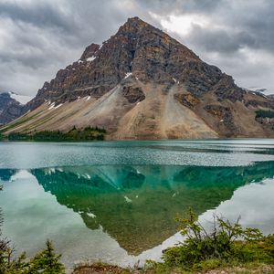 Preview wallpaper mountain, peak, lake, reflection, rocks