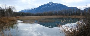 Preview wallpaper mountain, peak, lake, grass, nature