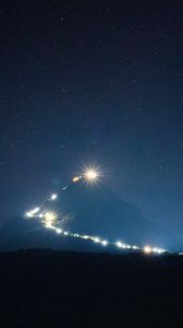 Preview wallpaper mountain, peak, light, night, lights, darkness