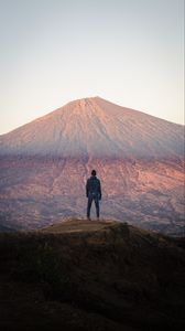 Preview wallpaper mountain, peak, man, loneliness, height