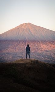 Preview wallpaper mountain, peak, man, loneliness, height