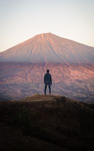 Preview wallpaper mountain, peak, man, loneliness, height