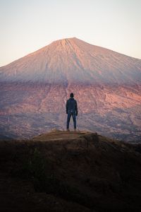 Preview wallpaper mountain, peak, man, loneliness, height
