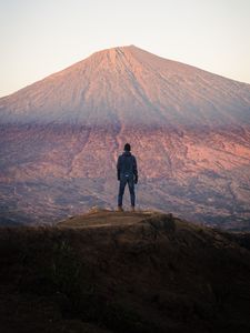 Preview wallpaper mountain, peak, man, loneliness, height