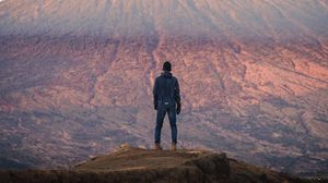 Preview wallpaper mountain, peak, man, loneliness, height