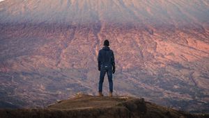 Preview wallpaper mountain, peak, man, loneliness, height