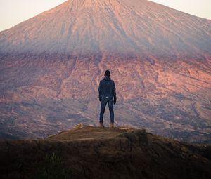 Preview wallpaper mountain, peak, man, loneliness, height