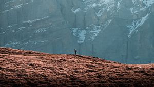 Preview wallpaper mountain, peak, man, alone, nature