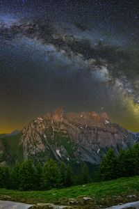 Preview wallpaper mountain, peak, milky way, road, night