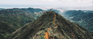 Preview wallpaper mountain, peak, people, sky, height