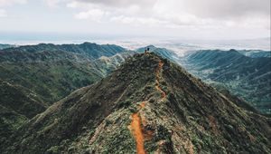 Preview wallpaper mountain, peak, people, sky, height
