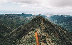 Preview wallpaper mountain, peak, people, sky, height