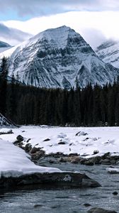 Preview wallpaper mountain, peak, river, forest, snow, snowy