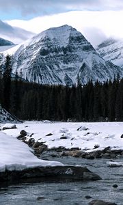 Preview wallpaper mountain, peak, river, forest, snow, snowy